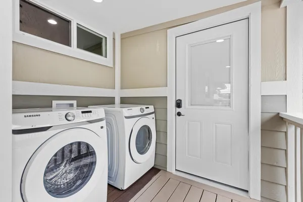 a utility room with dryer and washer