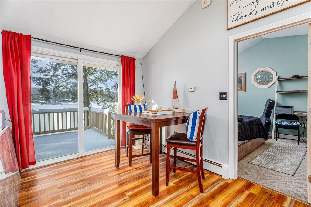 13 Browns Lake Road Ashburnham, MA 01430 - Photo 12 of 33 a view of a dining room with furniture and wooden floor