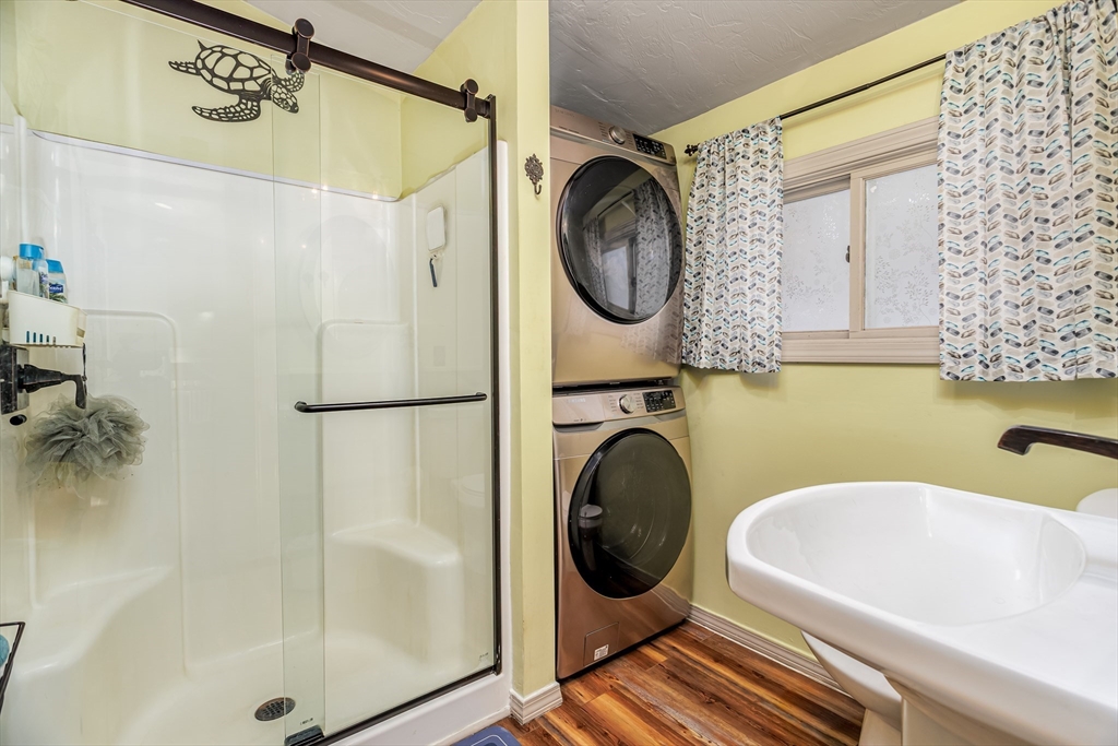 13 Browns Lake Road Ashburnham, MA 01430 - Photo 19 of 33 a bathroom with a bathtub and a shower