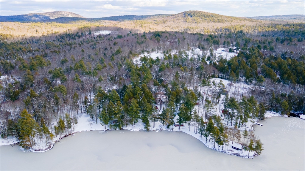 13 Browns Lake Road Ashburnham, MA 01430 - Photo 32 of 33 a view of a street with a mountain and trees in the background