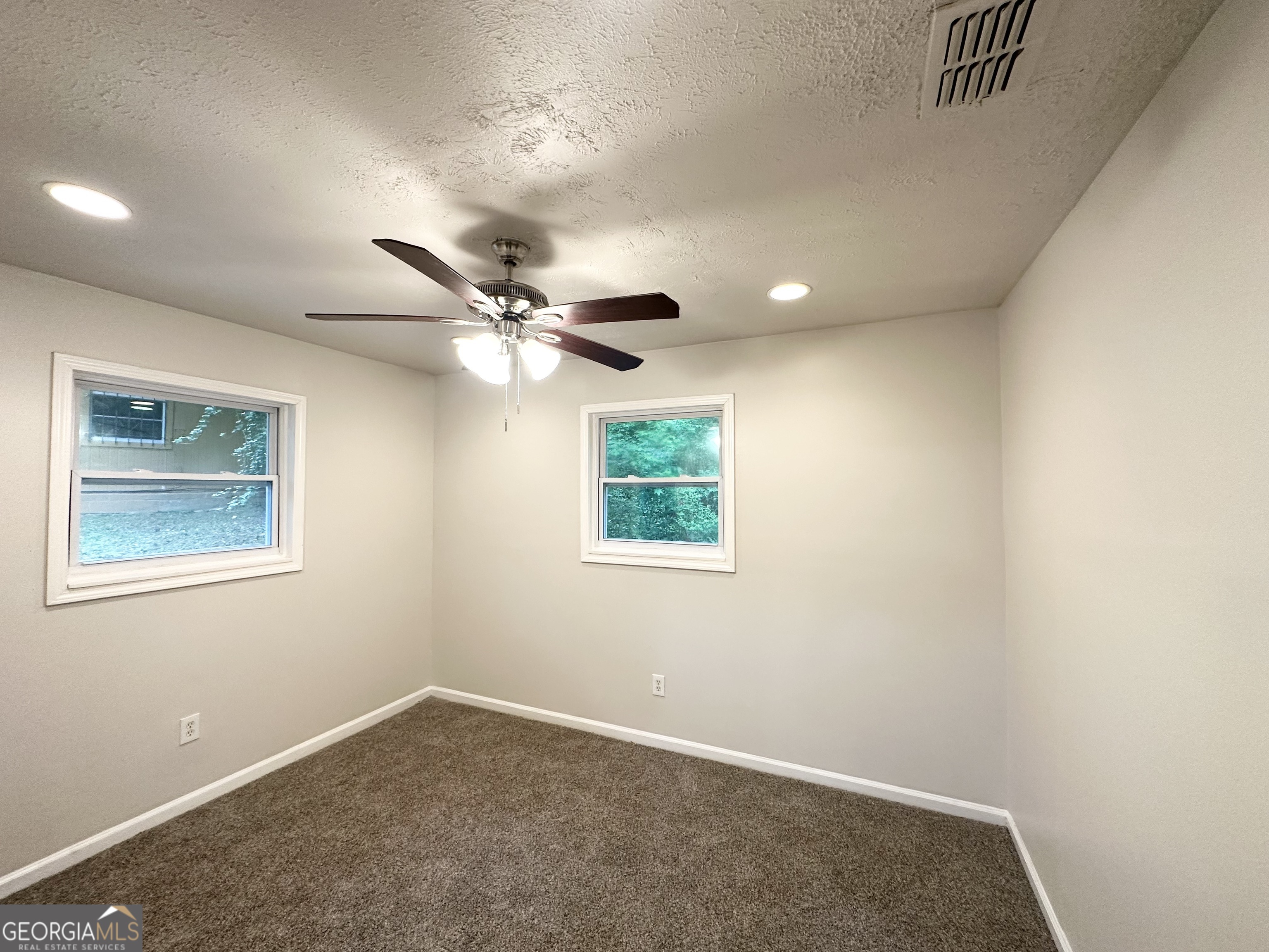 2930 Waters Road Southwest Atlanta, GA 30354 - Photo 10 of 14 an empty room with a window