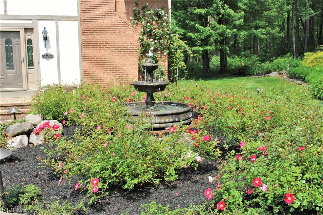6491 Dewey Road Thompson, OH 44086 - Photo 31 of 35 Fountain in the rose garden which blooms all summer.