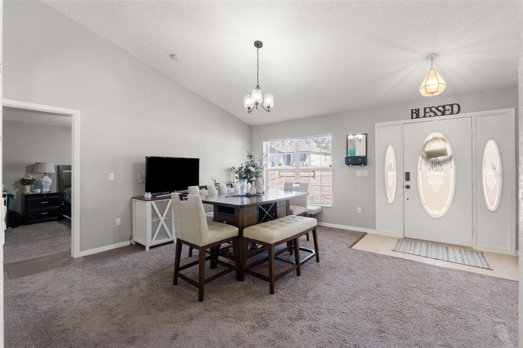 15335 Fleetwood Road Weeki Wachee, FL 34614 - Photo 6 of 40 a view of a livingroom with furniture and a flat screen tv