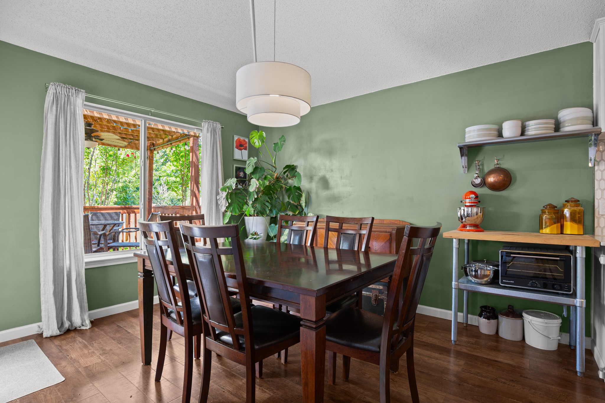 1205 Crossvine Way Pflugerville, TX 78660 - Photo 8 of 20 a view of a dining room with furniture window and wooden floor