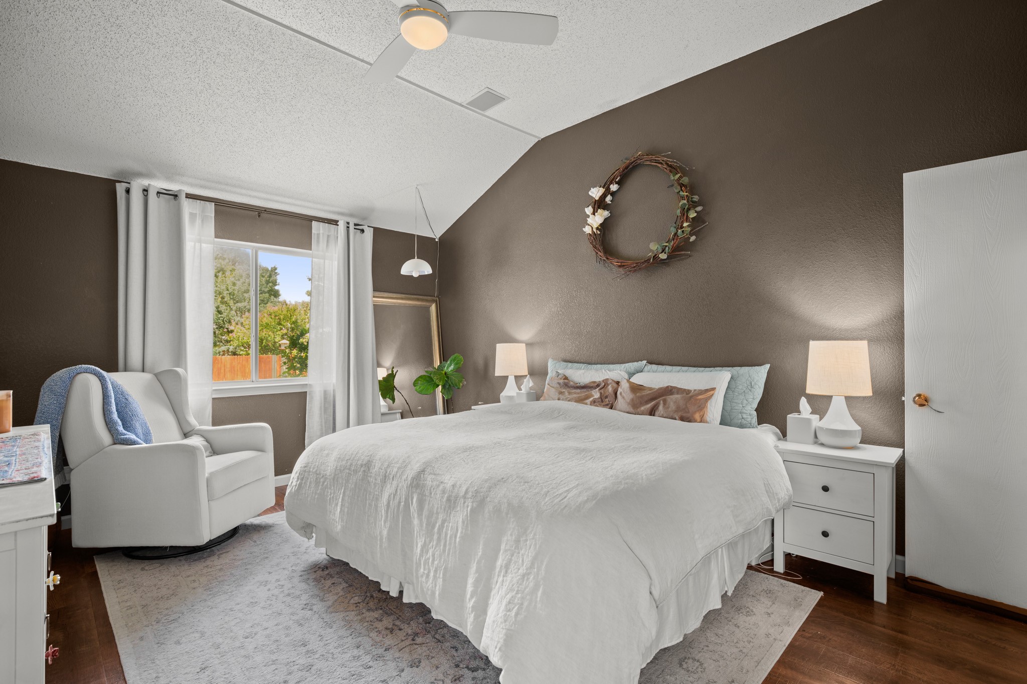 1205 Crossvine Way Pflugerville, TX 78660 - Photo 9 of 20 a bedroom with a bed and window