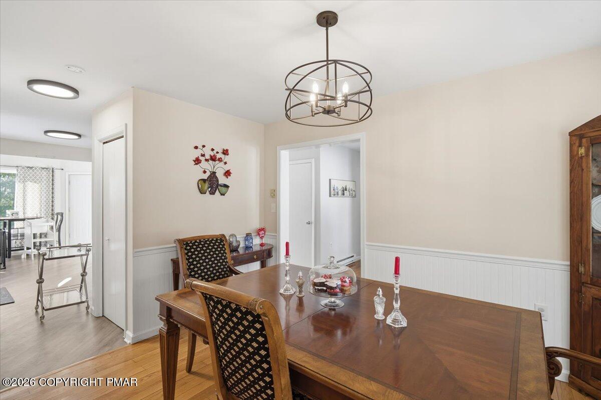 8824 Laird Road Stroudsburg, PA 18360 - Photo 15 of 53 a view of a dining room with furniture