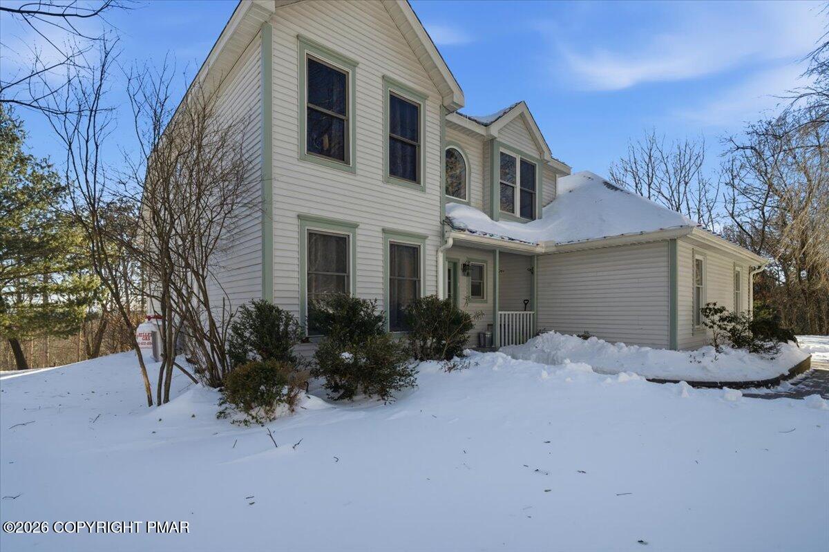 8824 Laird Road Stroudsburg, PA 18360 - Photo 22 of 53 a front view of a house with a yard