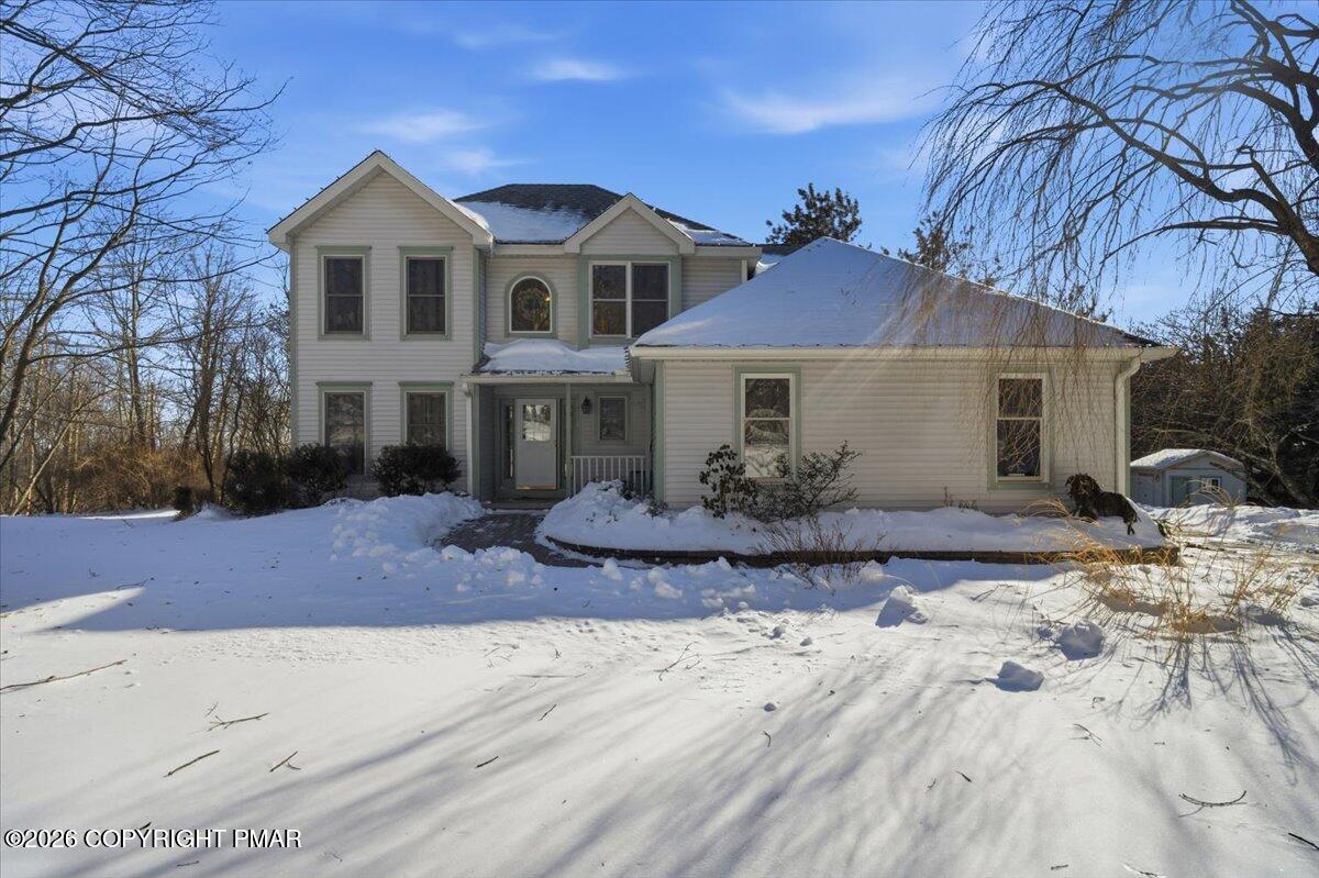 8824 Laird Road Stroudsburg, PA 18360 - Photo 25 of 53 a front view of a house with yard