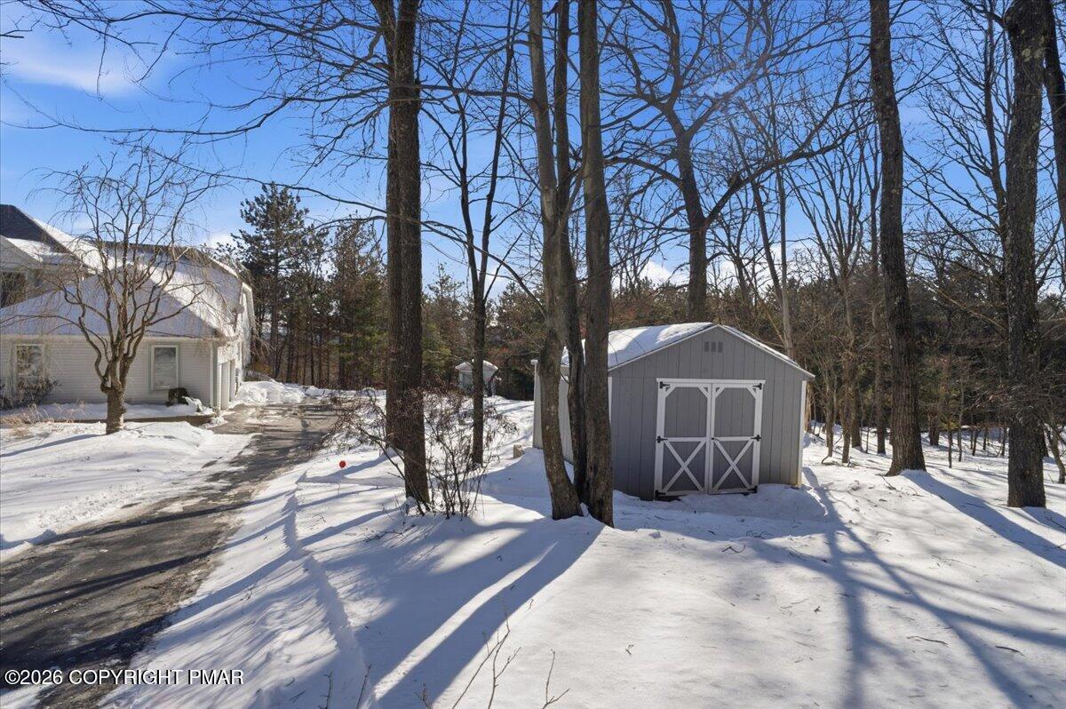8824 Laird Road Stroudsburg, PA 18360 - Photo 28 of 53 a view of a house with snow on the road