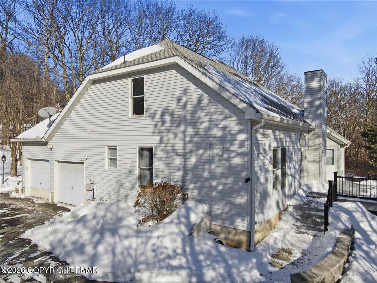 8824 Laird Road Stroudsburg, PA 18360 - Photo 30 of 53 a view of a house with a yard