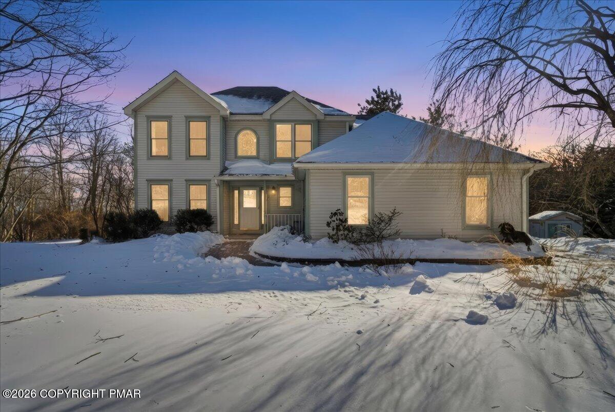 8824 Laird Road Stroudsburg, PA 18360 - Photo 3 of 53 a front view of a house with yard and trees