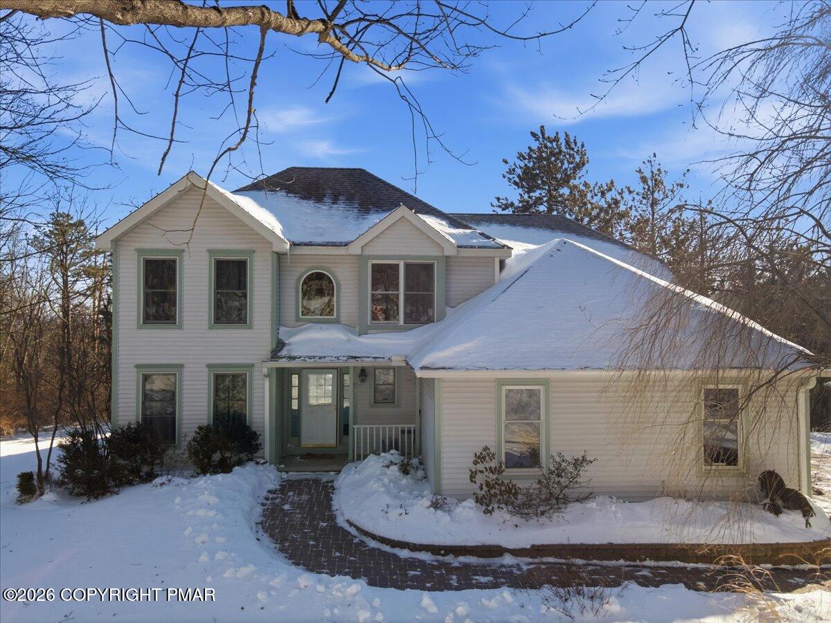 8824 Laird Road Stroudsburg, PA 18360 - Photo 31 of 53 a front view of a house with garden