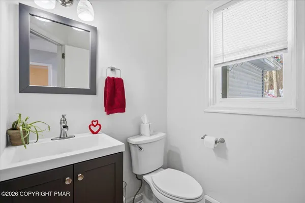 a bathroom with a sink and a toilet