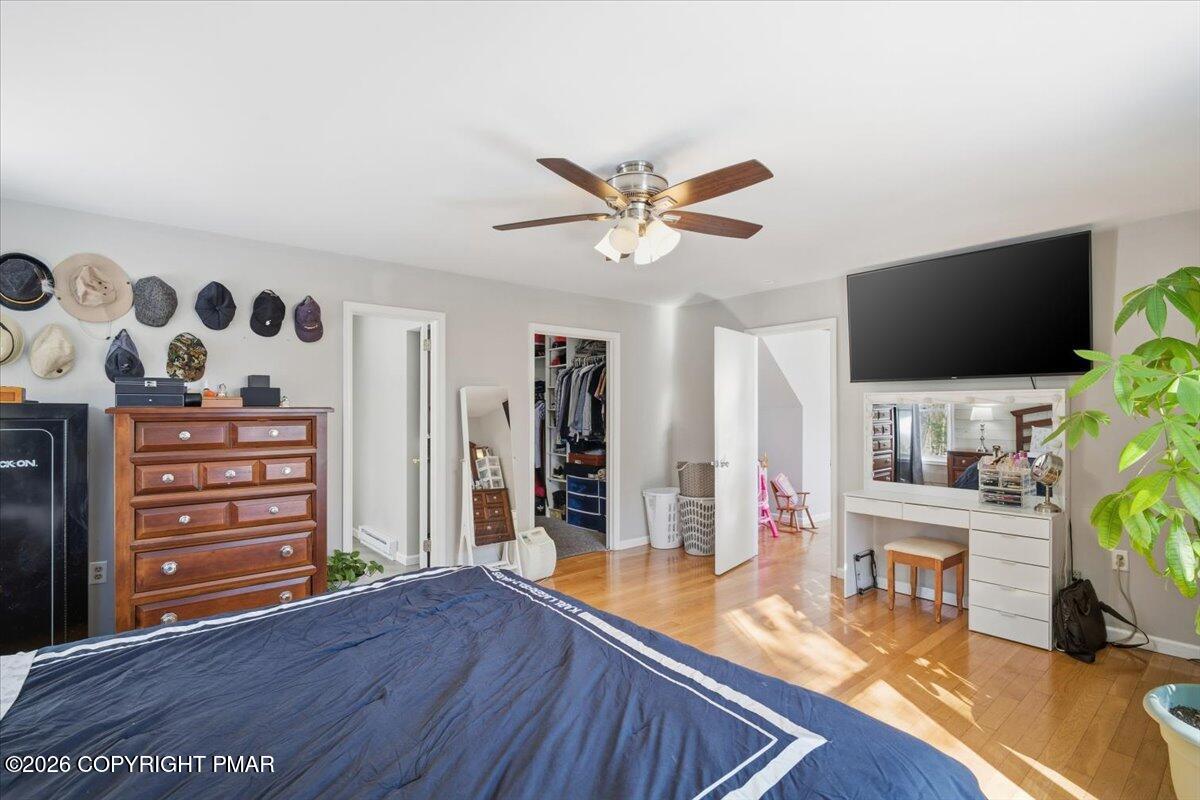 8824 Laird Road Stroudsburg, PA 18360 - Photo 37 of 53 a view of a livingroom with furniture and a flat screen tv