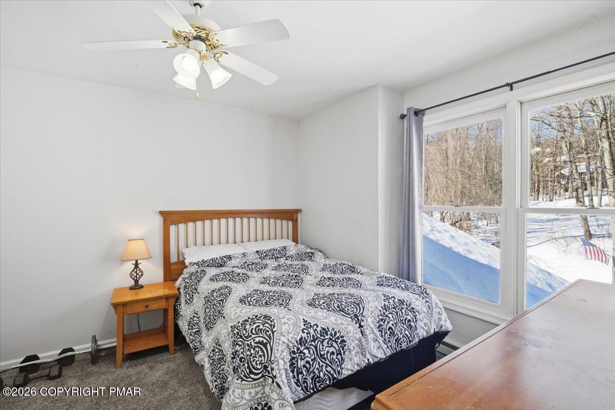 8824 Laird Road Stroudsburg, PA 18360 - Photo 41 of 53 a bedroom with a bed and a window