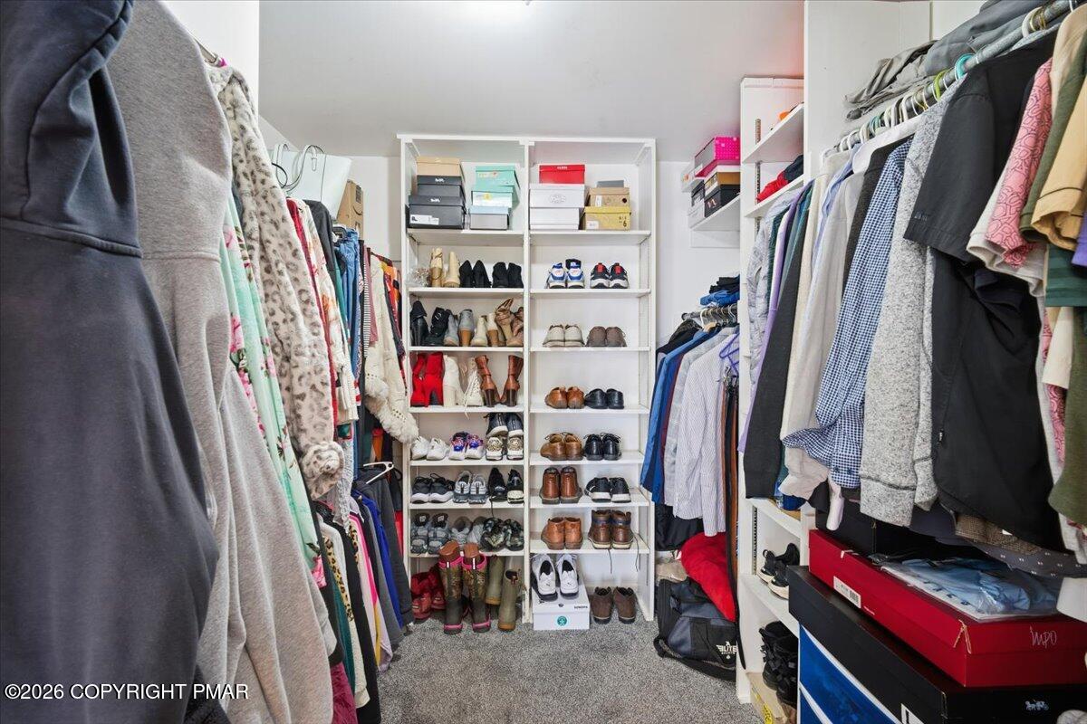 8824 Laird Road Stroudsburg, PA 18360 - Photo 47 of 53 a view of walk in closet with clothes and shoes