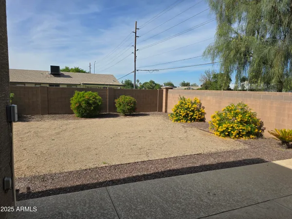 a view of a garden with an outdoor space