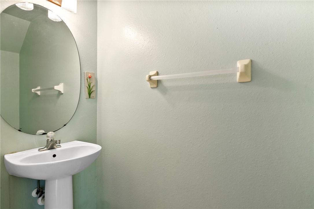 11030 Palm Ridge Lane, Unit 17 Tamarac, FL 33321 - Photo 6 of 32 Downstairs half bath