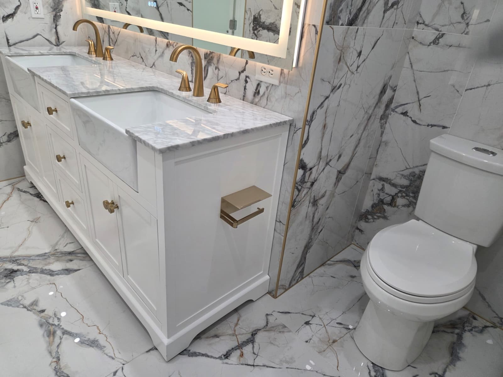 7019 Brody Lane Houston, TX 77083 - Photo 13 of 26 a bathroom with a granite countertop sink a toilet and a shower