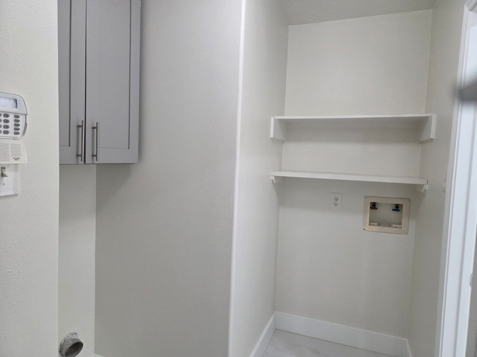 7019 Brody Lane Houston, TX 77083 - Photo 18 of 26 a view of walk in closet with empty racks