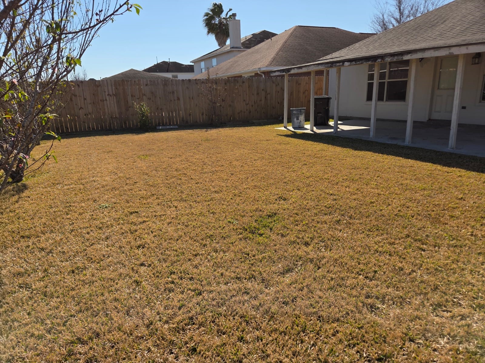 7019 Brody Lane Houston, TX 77083 - Photo 23 of 26 a front view of house with yard and car parked