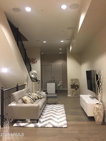 a living room with furniture and a couch