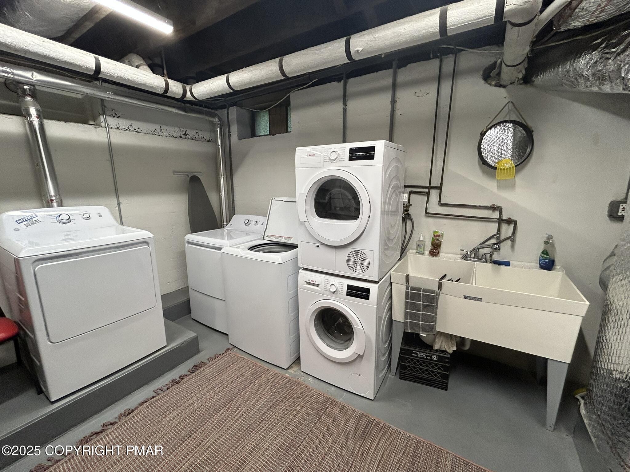 540 Sarah Street, Unit 102 Stroudsburg, PA 18360 - Photo 12 of 12 a utility room with dryer and washer