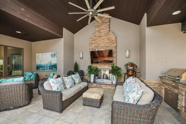 a front view of a house with patio