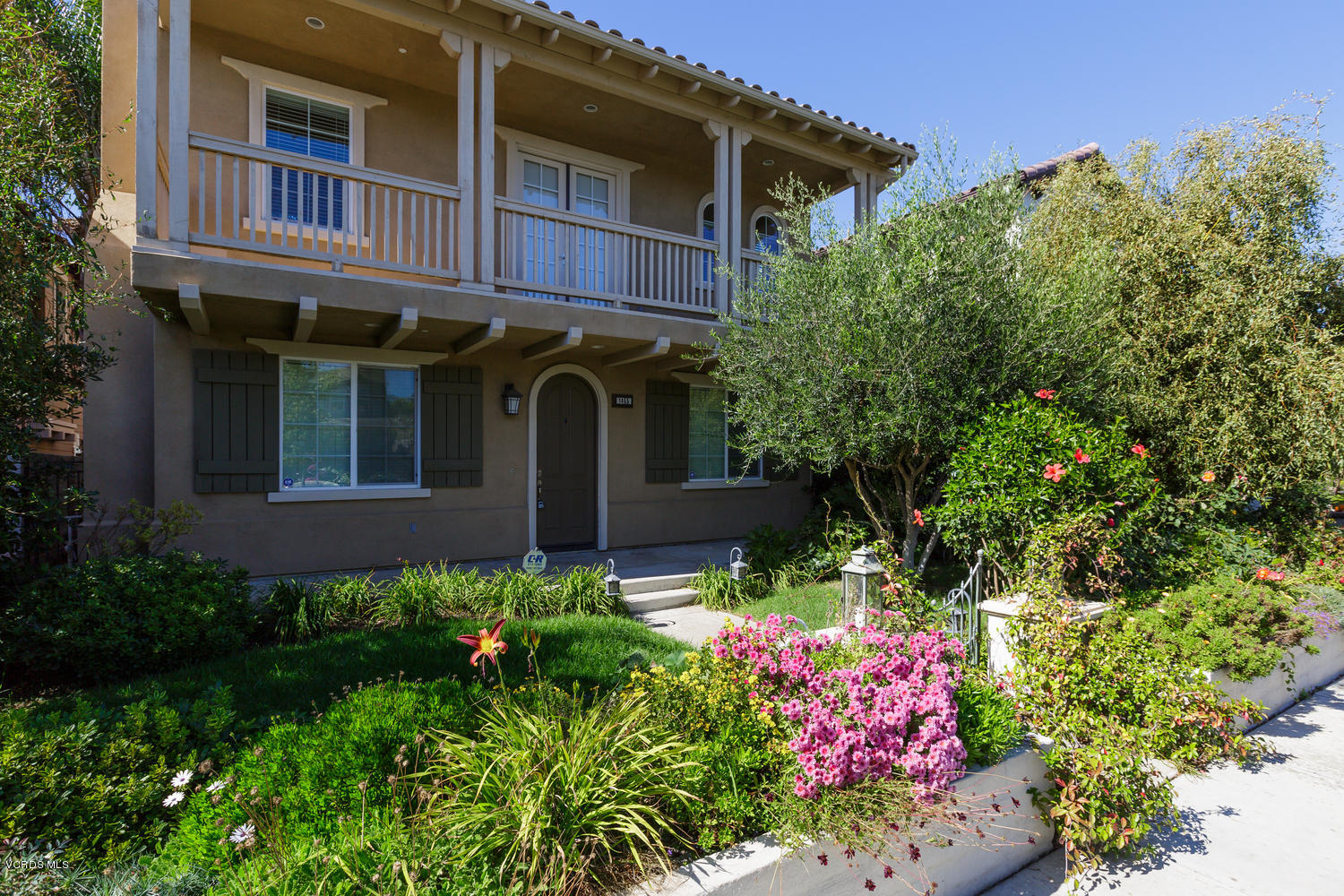 1455 Donegal Way Oxnard, CA 93035 - Photo 1 of 32 front view of a house with a yard