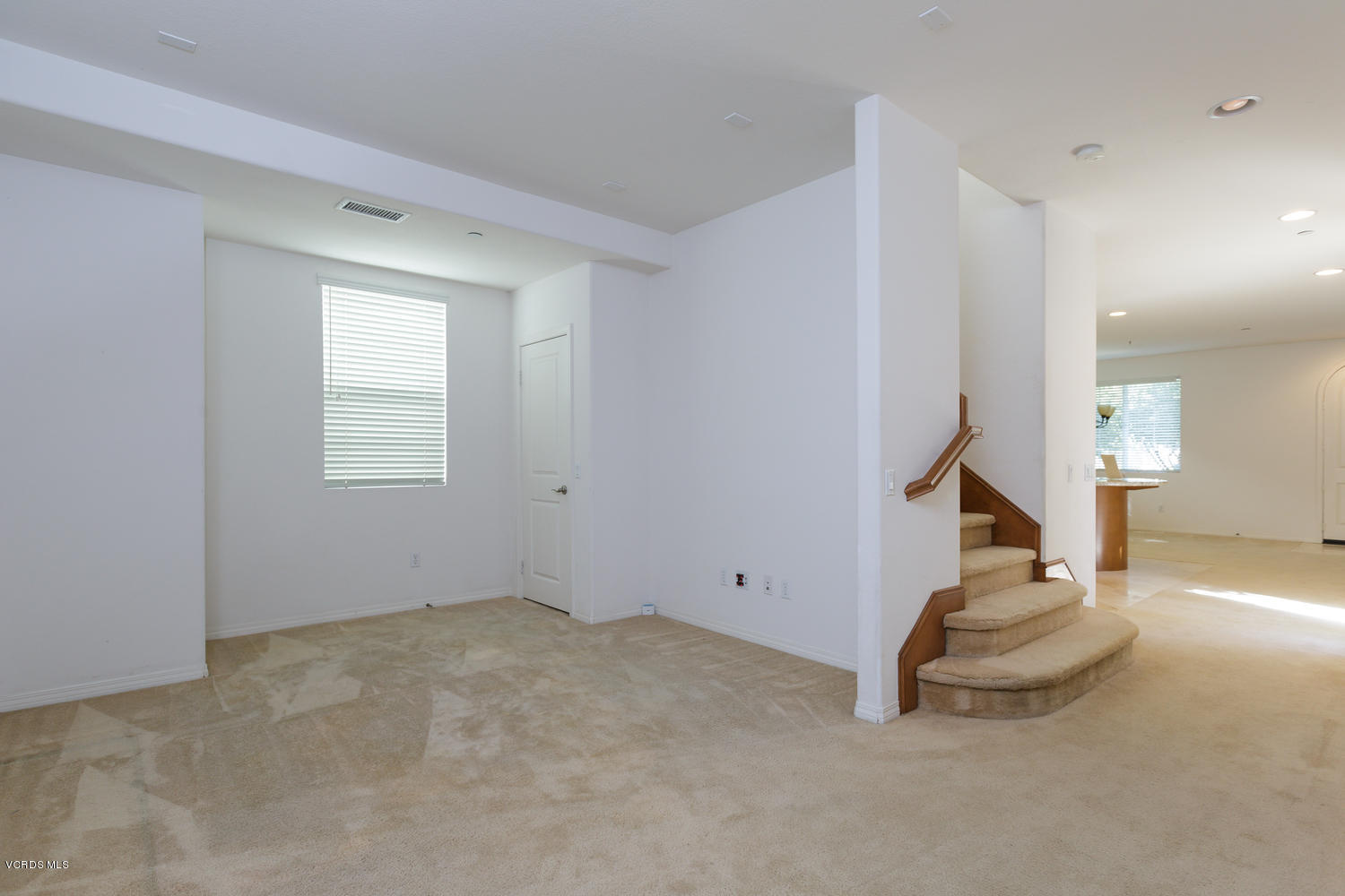 1455 Donegal Way Oxnard, CA 93035 - Photo 12 of 32 a view of an empty room with a fireplace