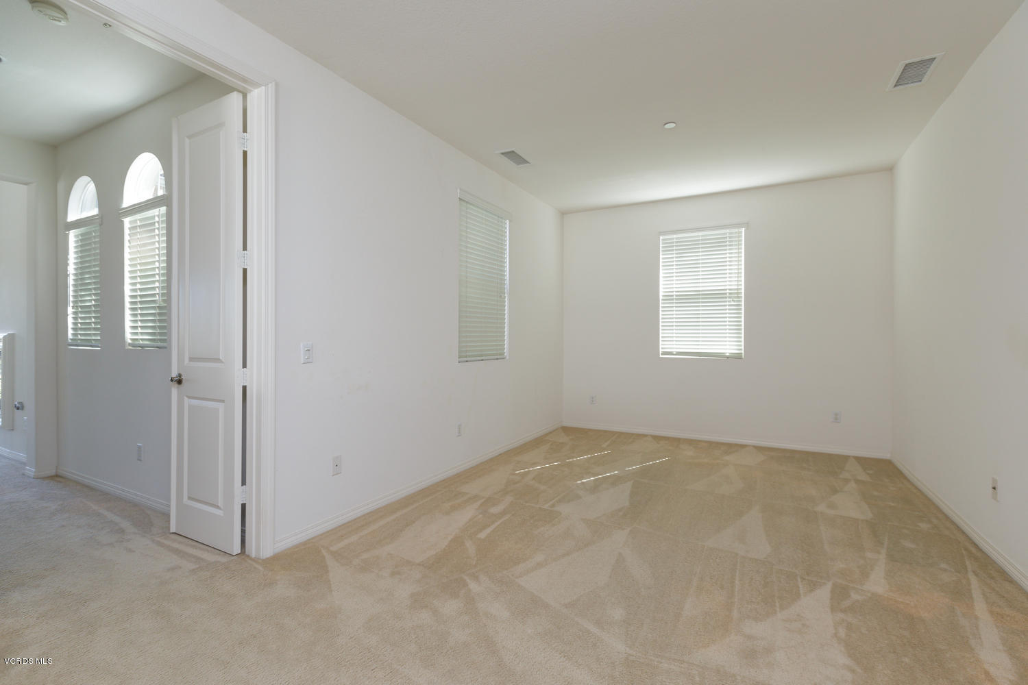 1455 Donegal Way Oxnard, CA 93035 - Photo 14 of 32 an empty room with windows and closet