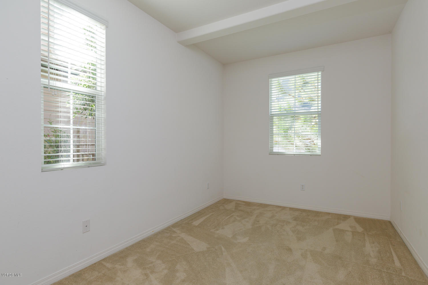 1455 Donegal Way Oxnard, CA 93035 - Photo 21 of 32 an empty room with a window