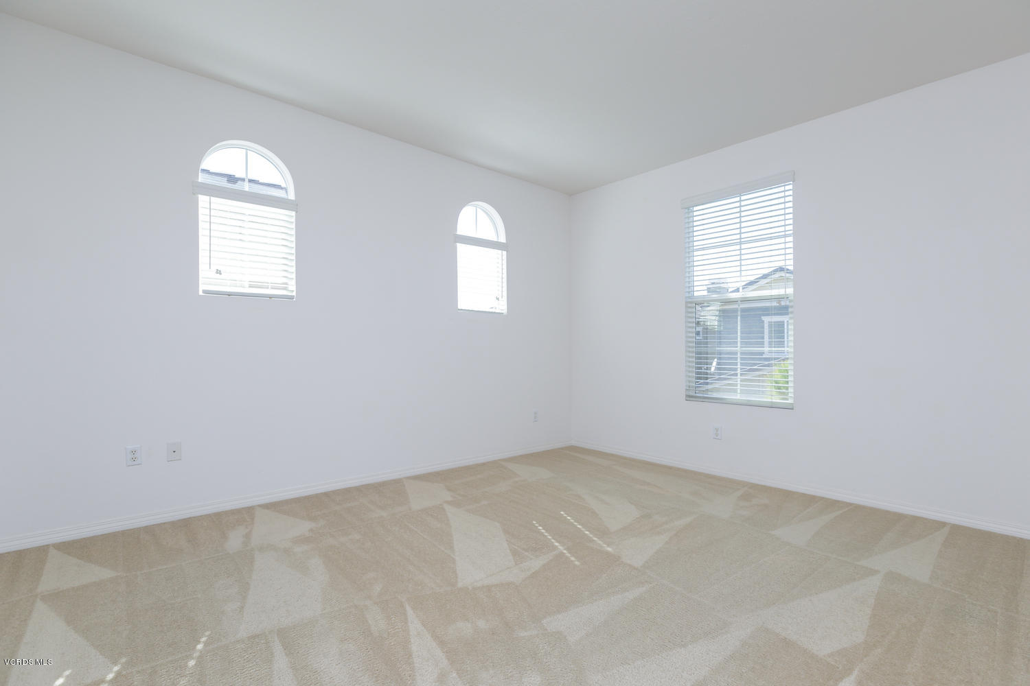 1455 Donegal Way Oxnard, CA 93035 - Photo 23 of 32 an empty room with a window