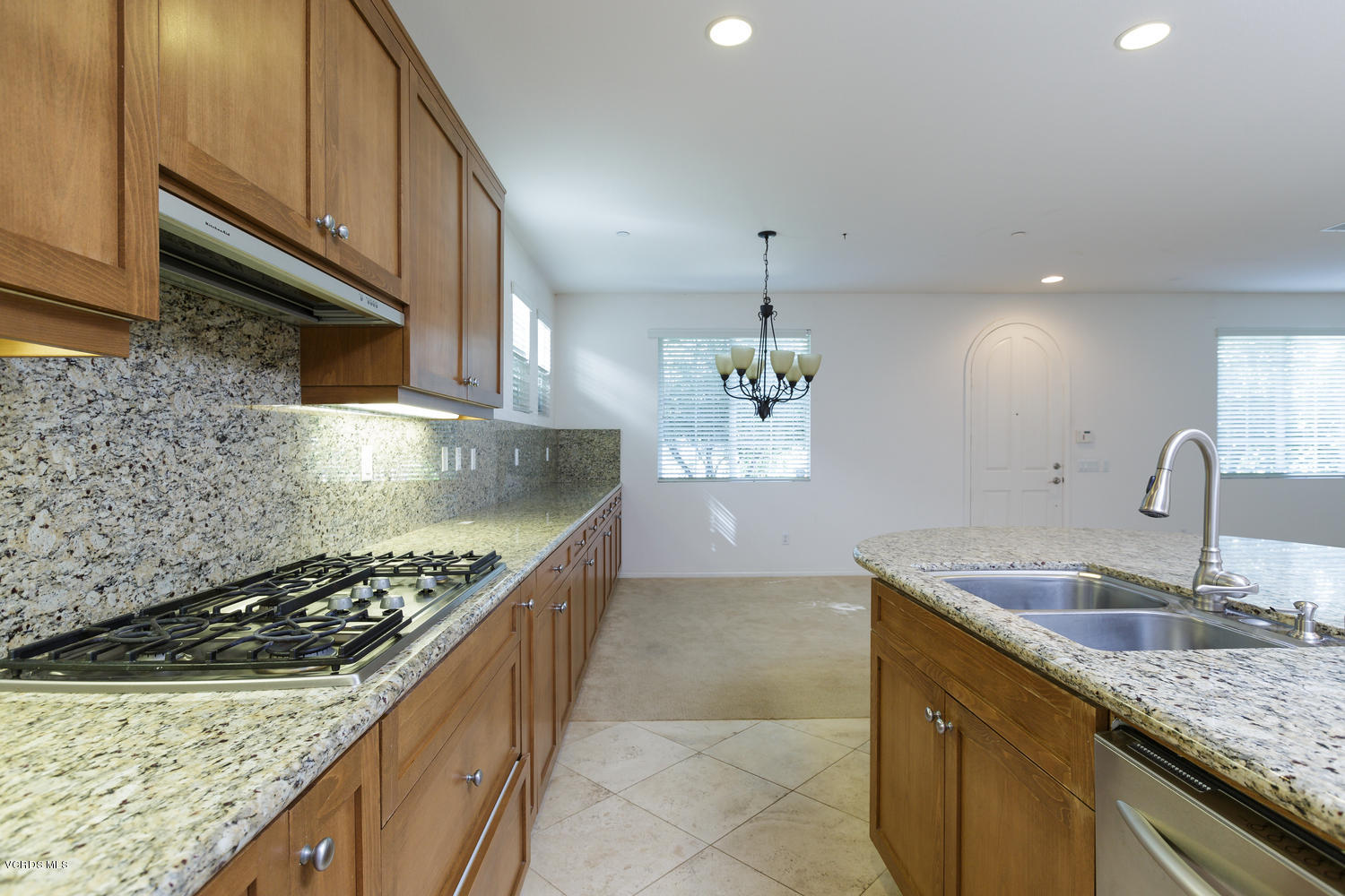 1455 Donegal Way Oxnard, CA 93035 - Photo 10 of 32 a kitchen with stainless steel appliances granite countertop a sink and a stove