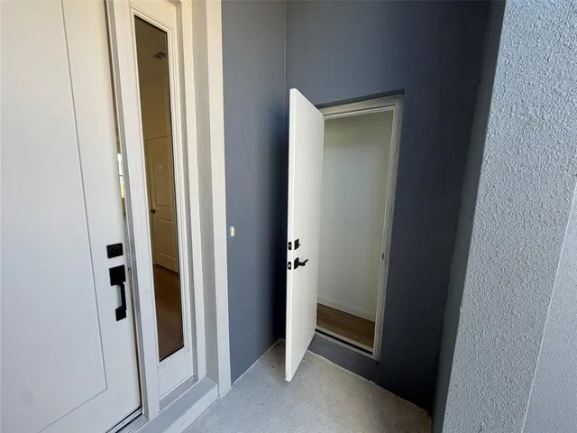 a view of front door with hallway