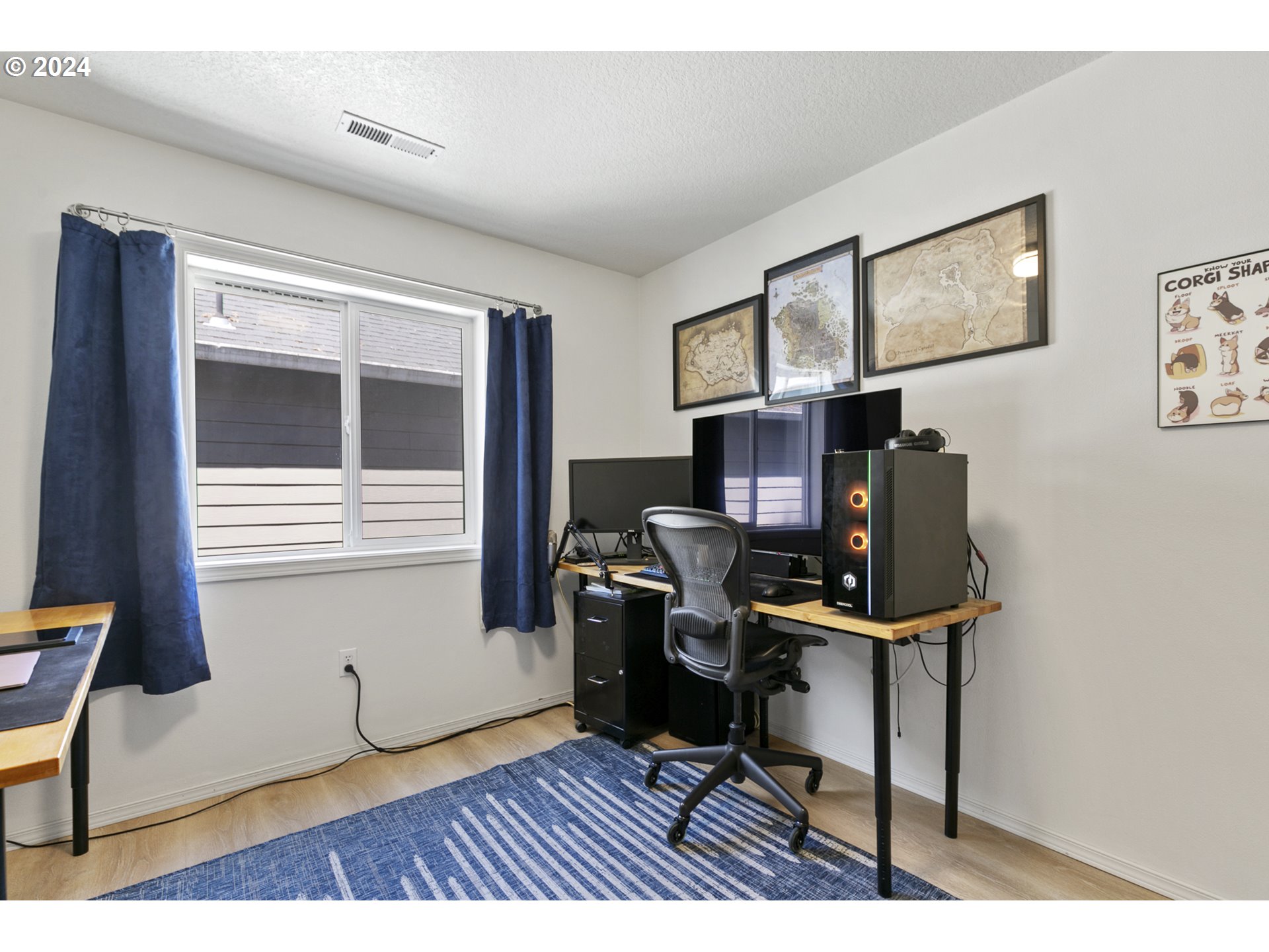 3041 South Cedar Ridge Drive Ridgefield, WA 98642 - Photo 21 of 26 a view of a workspace with furniture and a window
