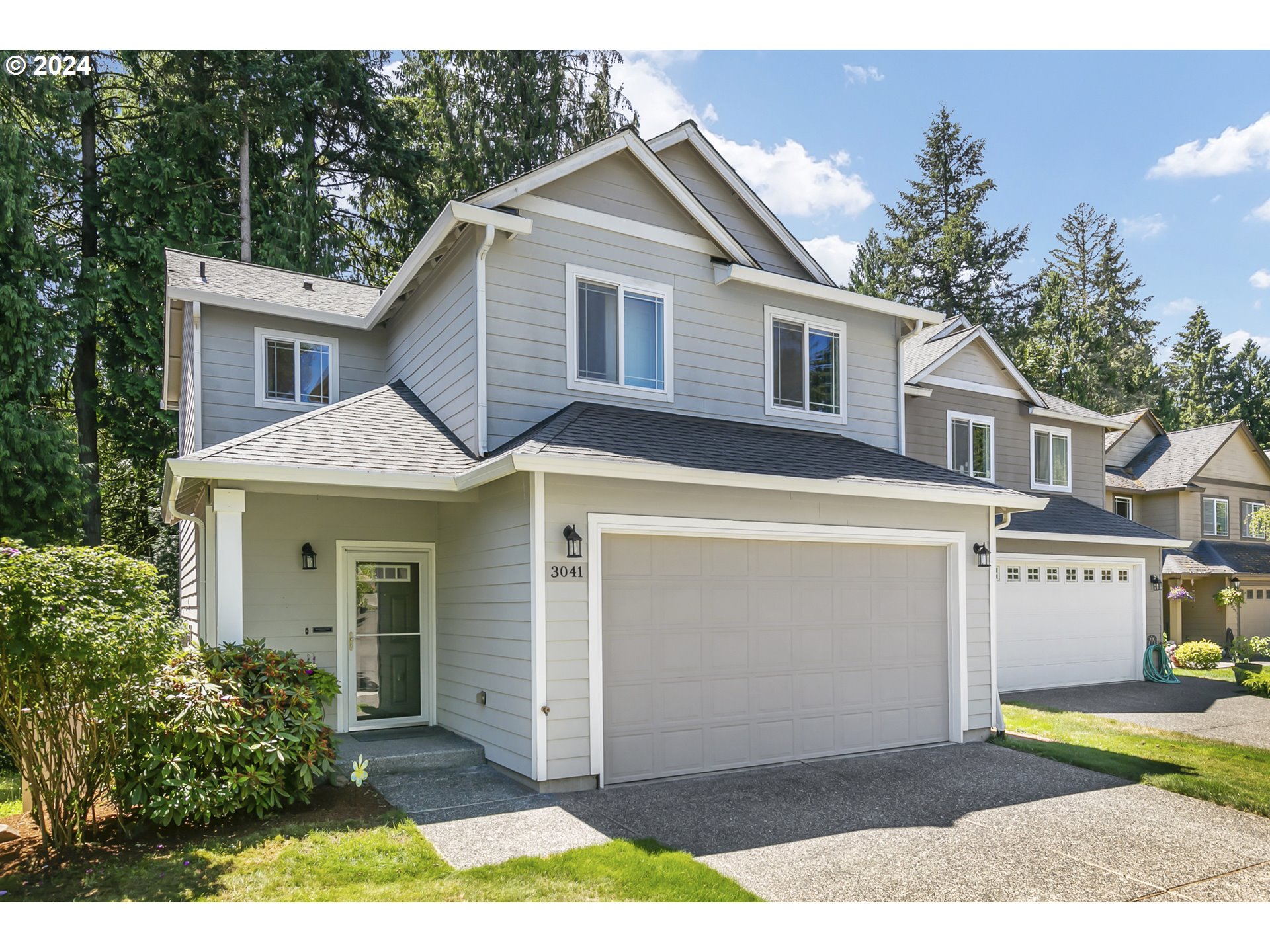 3041 South Cedar Ridge Drive Ridgefield, WA 98642 - Photo 26 of 26 a view of a yard in front of a house