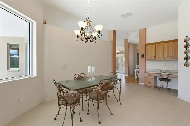 a kitchen that has a sink and a stove