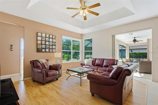 a spacious bathroom with a granite countertop sink a toilet and a mirror