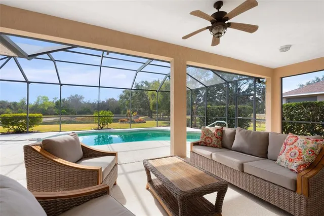 a front view of a house with yard and green space