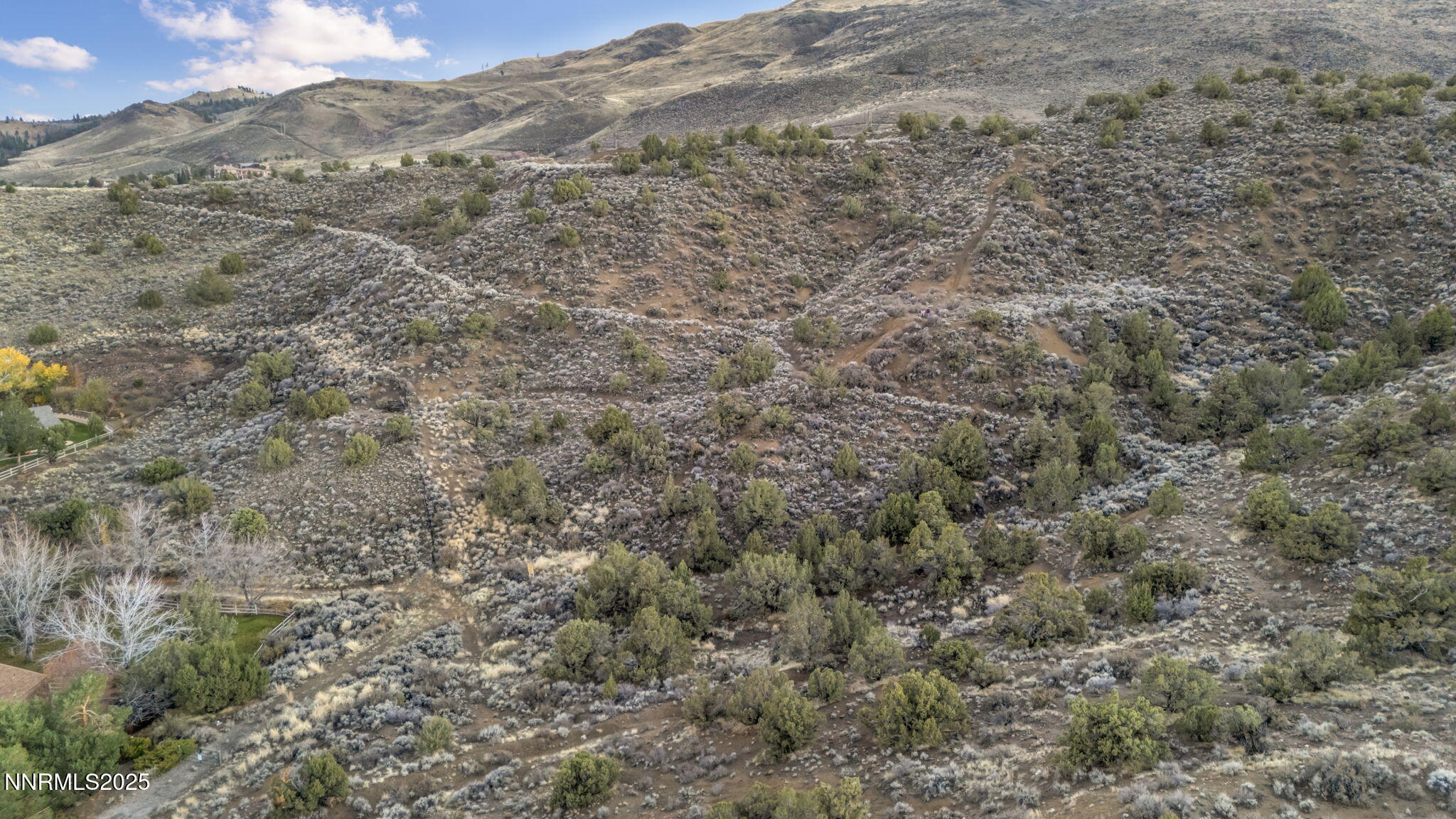 0 Woodchuck Circle, Unit 4105124 Reno, NV 89519 - Photo 24 of 30 a view of a dry yard with mountains and green space