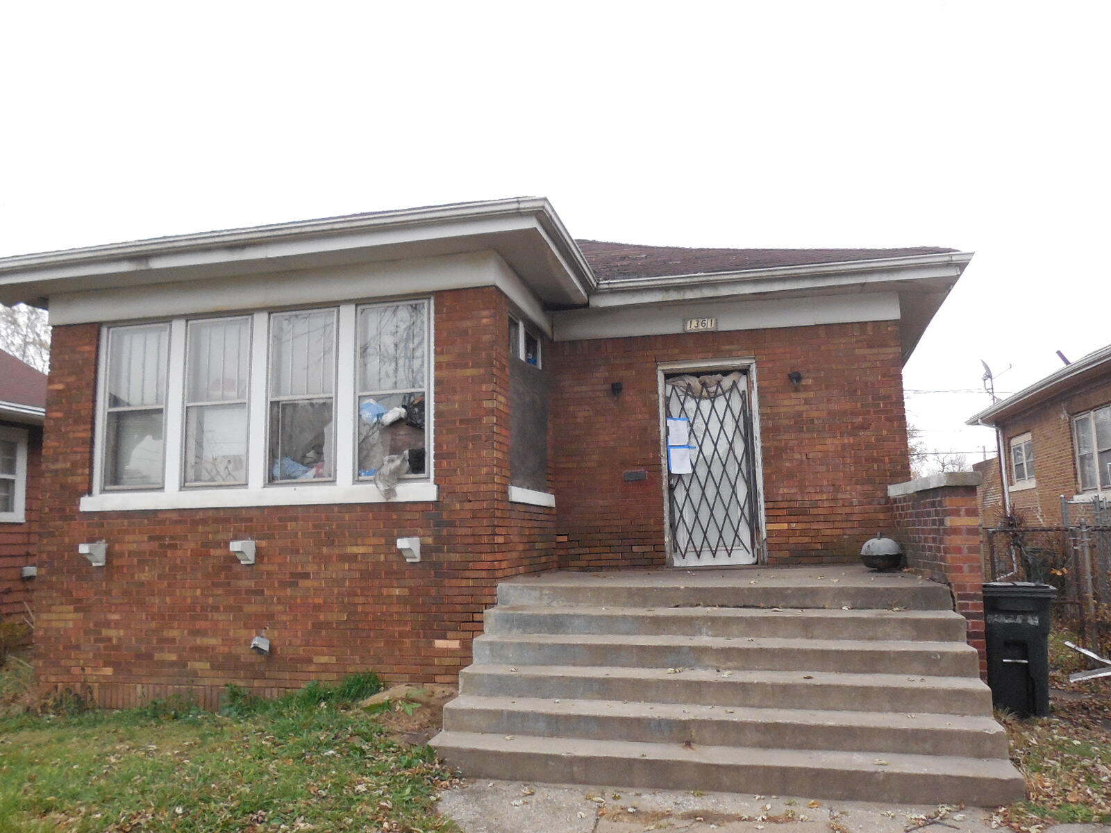 1361 Harrison Boulevard Gary, IN 46407 - Photo 1 of 1 a front view of a house