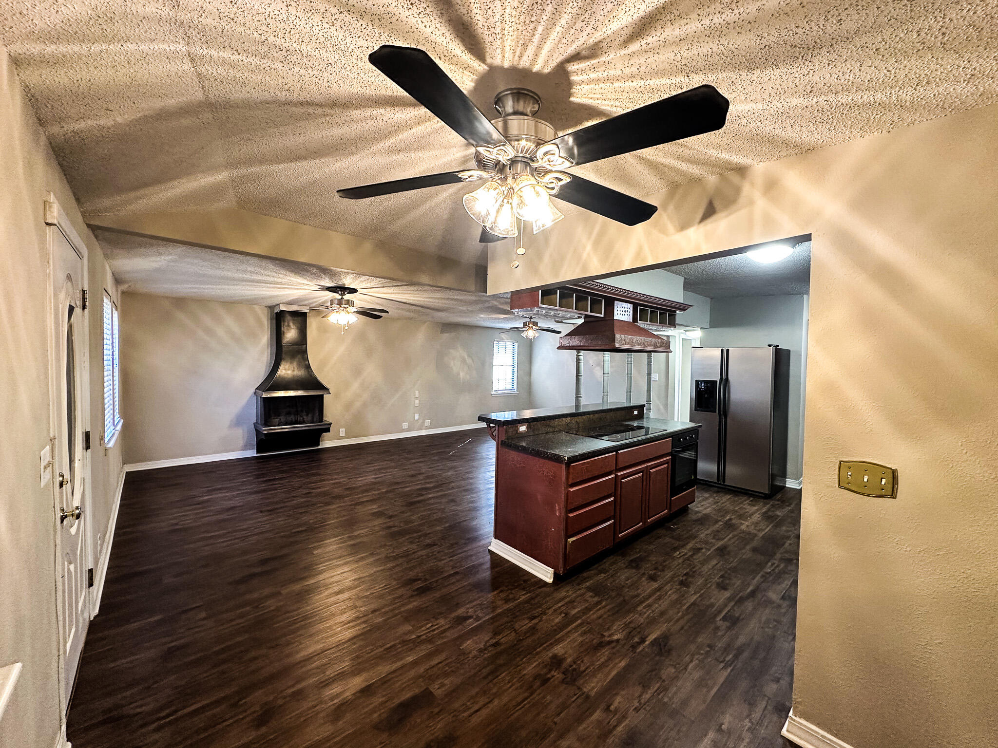 2101 48th Street Lubbock, TX 79412 - Photo 27 of 36 a view of entryway and hall with wooden floor