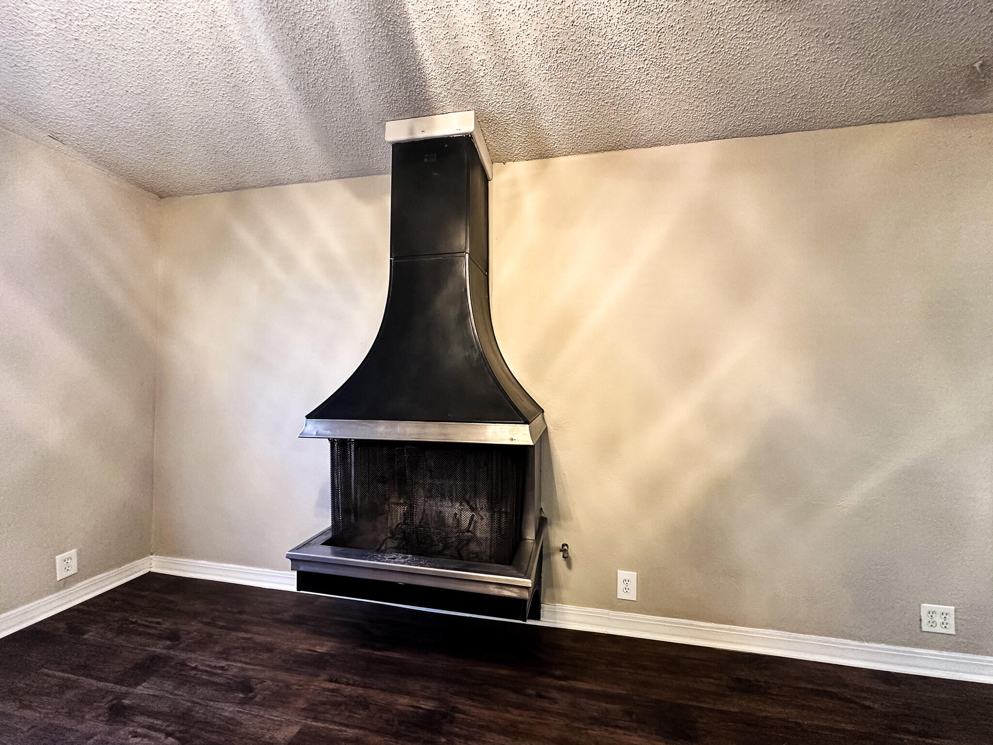 2101 48th Street Lubbock, TX 79412 - Photo 6 of 36 a living room with a fireplace