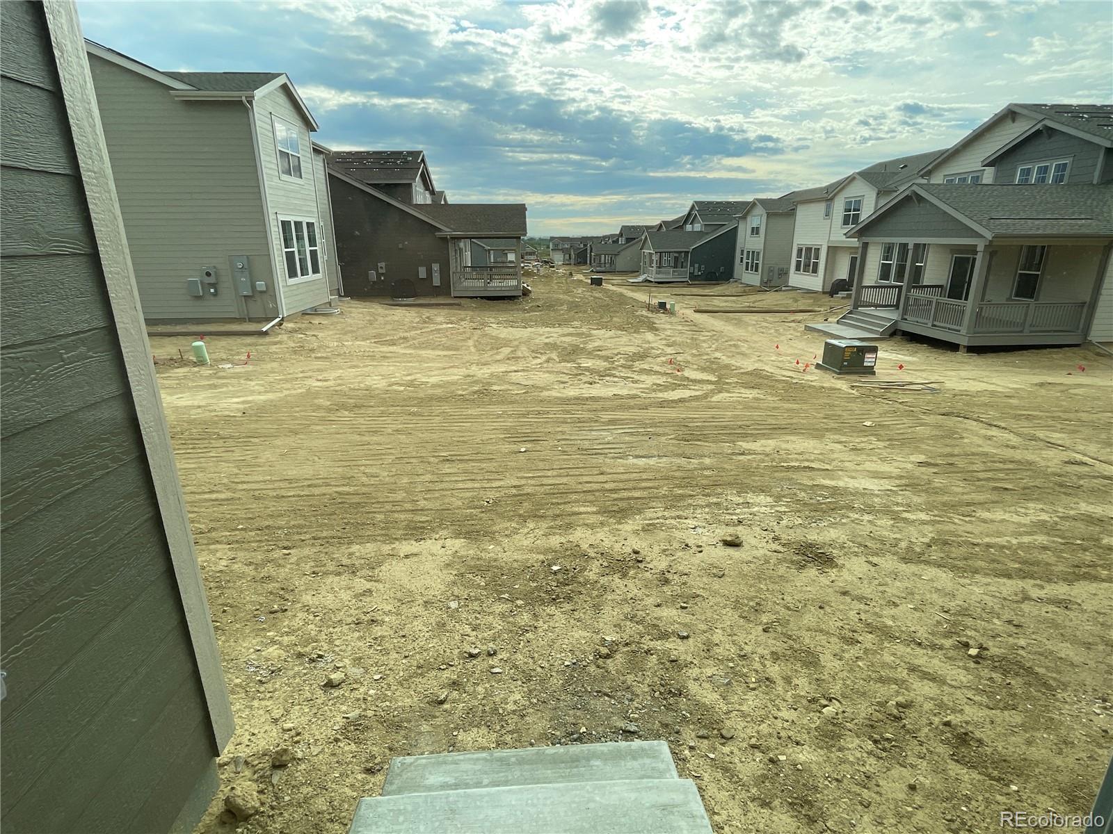 12880 Range Street Firestone, CO 80504 - Photo 12 of 21 a view of residential houses with an outdoor space