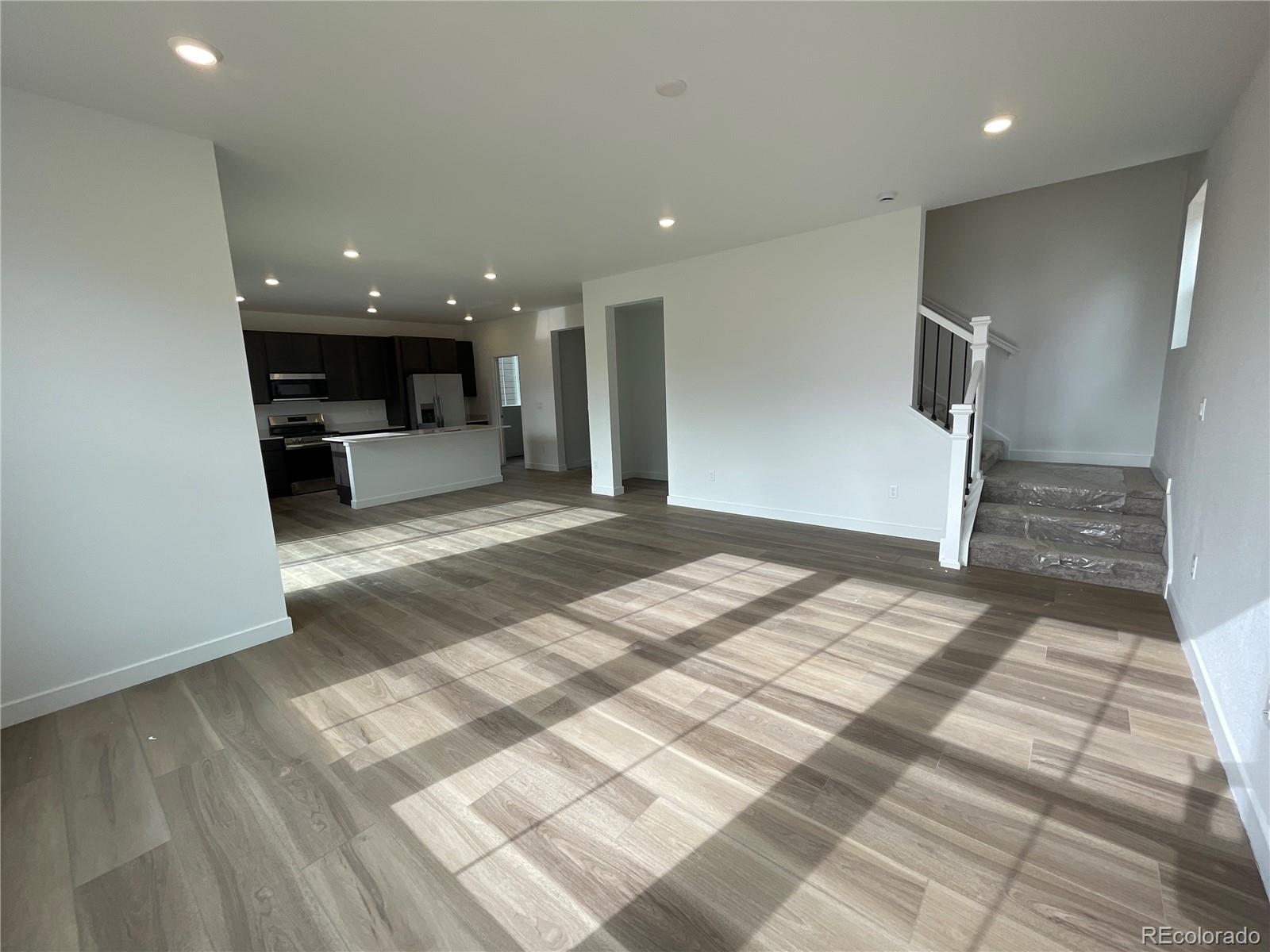 12880 Range Street Firestone, CO 80504 - Photo 3 of 21 a view of kitchen with windows