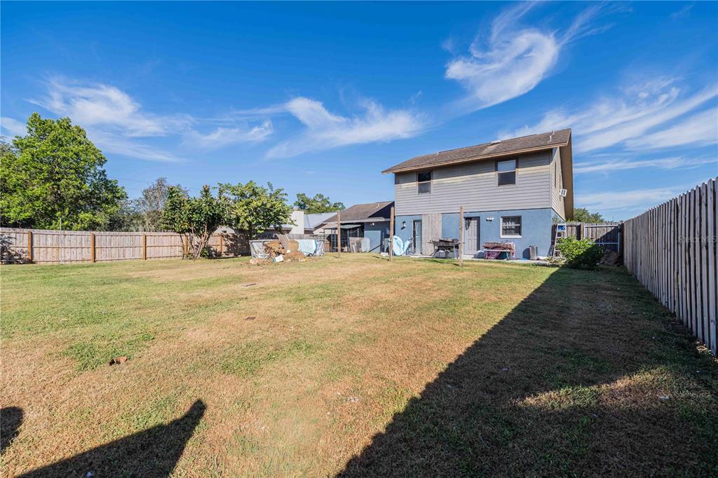 2221 Eastmeadows Road Lakeland, FL 33812 - Photo 4 of 39 a house with garden in front of it