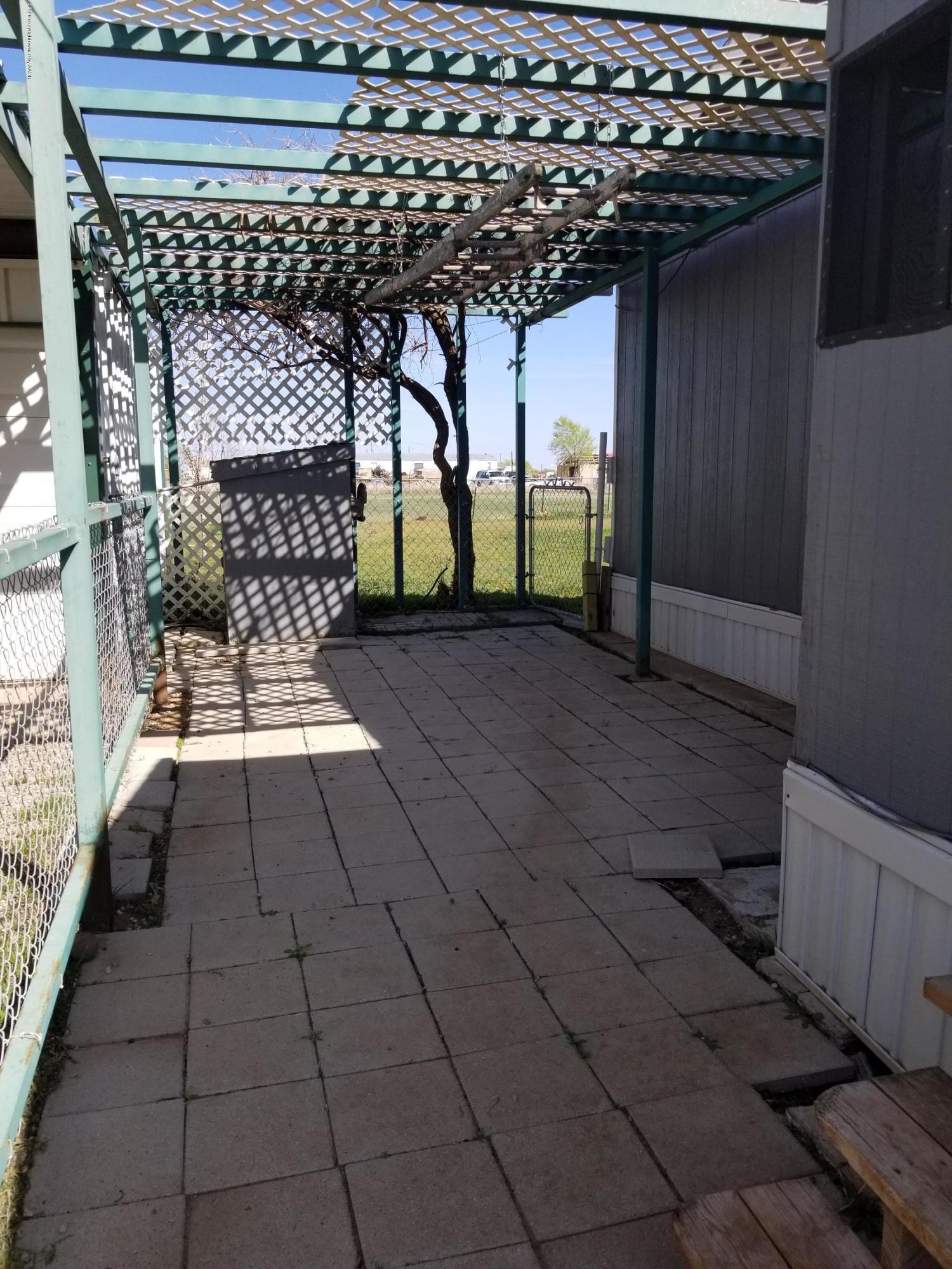 12307 Lazy B Road Amarillo, TX 79118 - Photo 28 of 32 covered area between house and garage