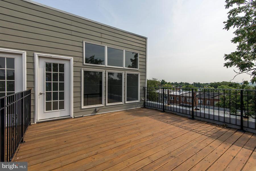 1424 L Street Southeast, Unit 302 Washington, DC 20003 - Photo 3 of 22 View from deck towards upper level