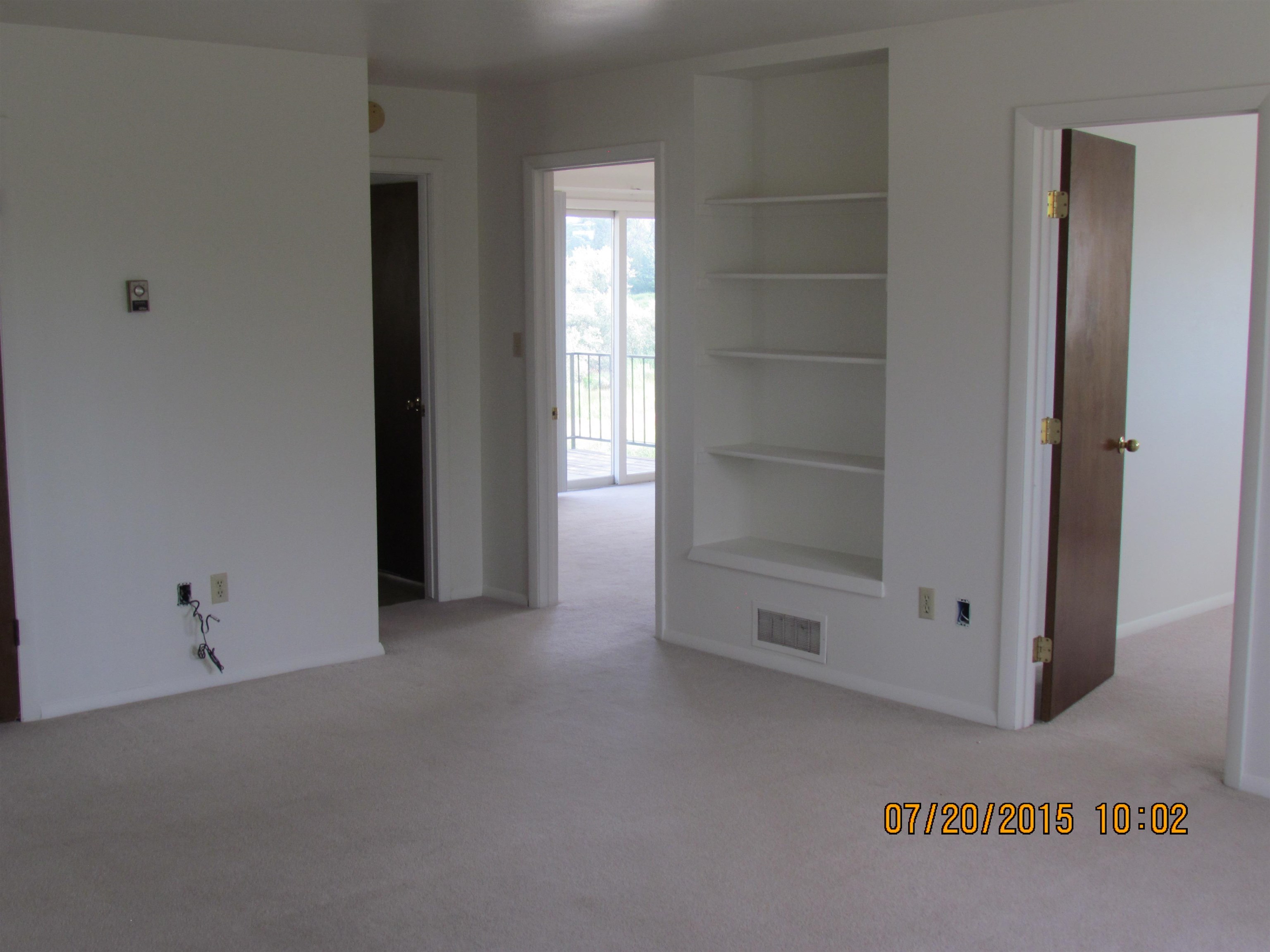 1179 17 Road Fruita, CO 81521 - Photo 13 of 41 a view of an empty room with a fireplace